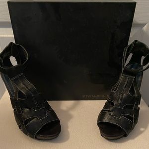 Good condition!  Black Steve Madden high heels